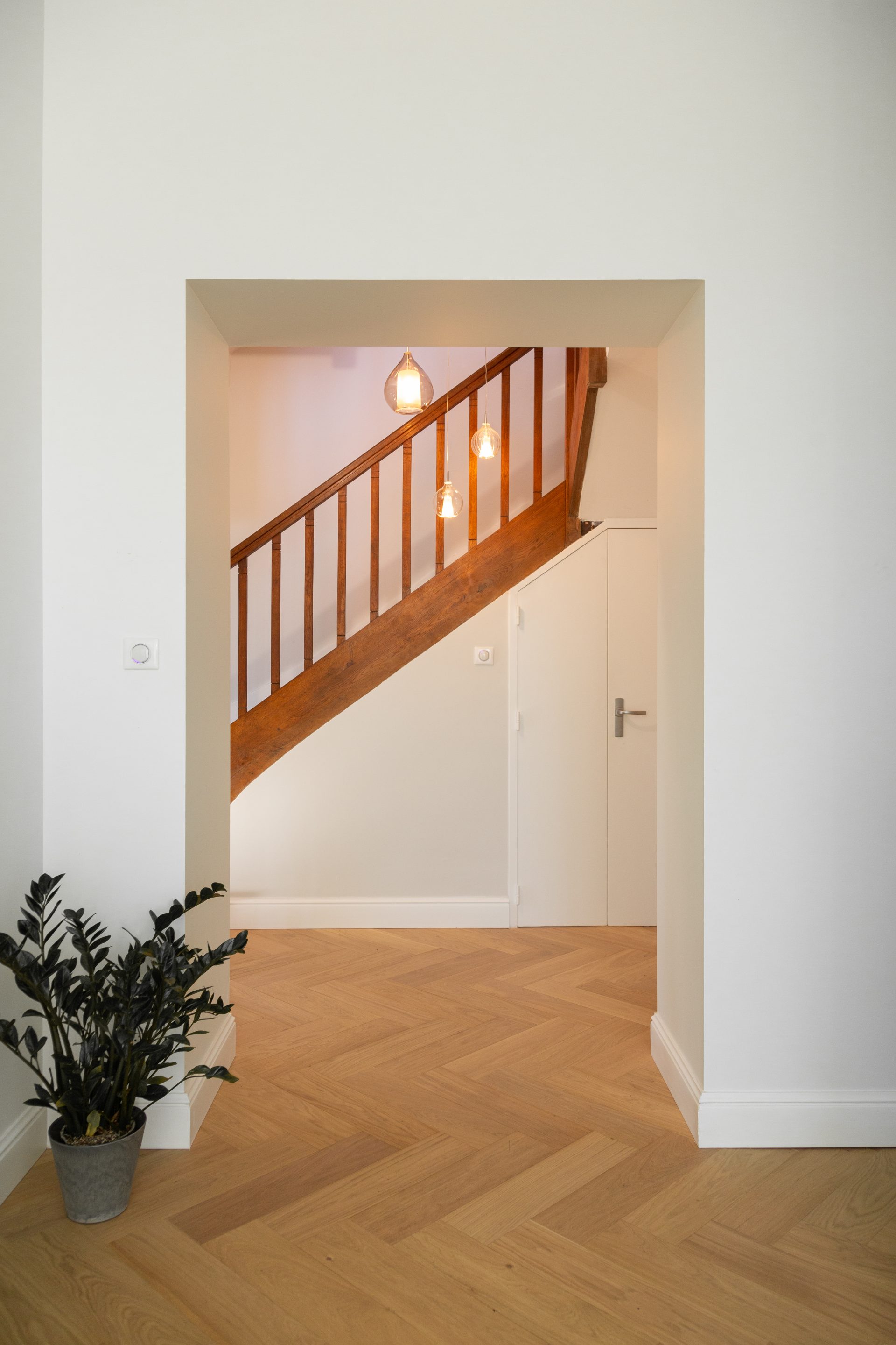 Pose de parquet dans une entrée